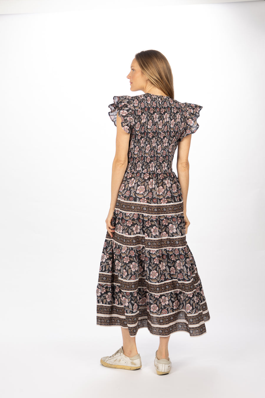 Bindu Bella Dress Black Multi – cotton floral maxi dress with smocked bodice and flutter sleeves