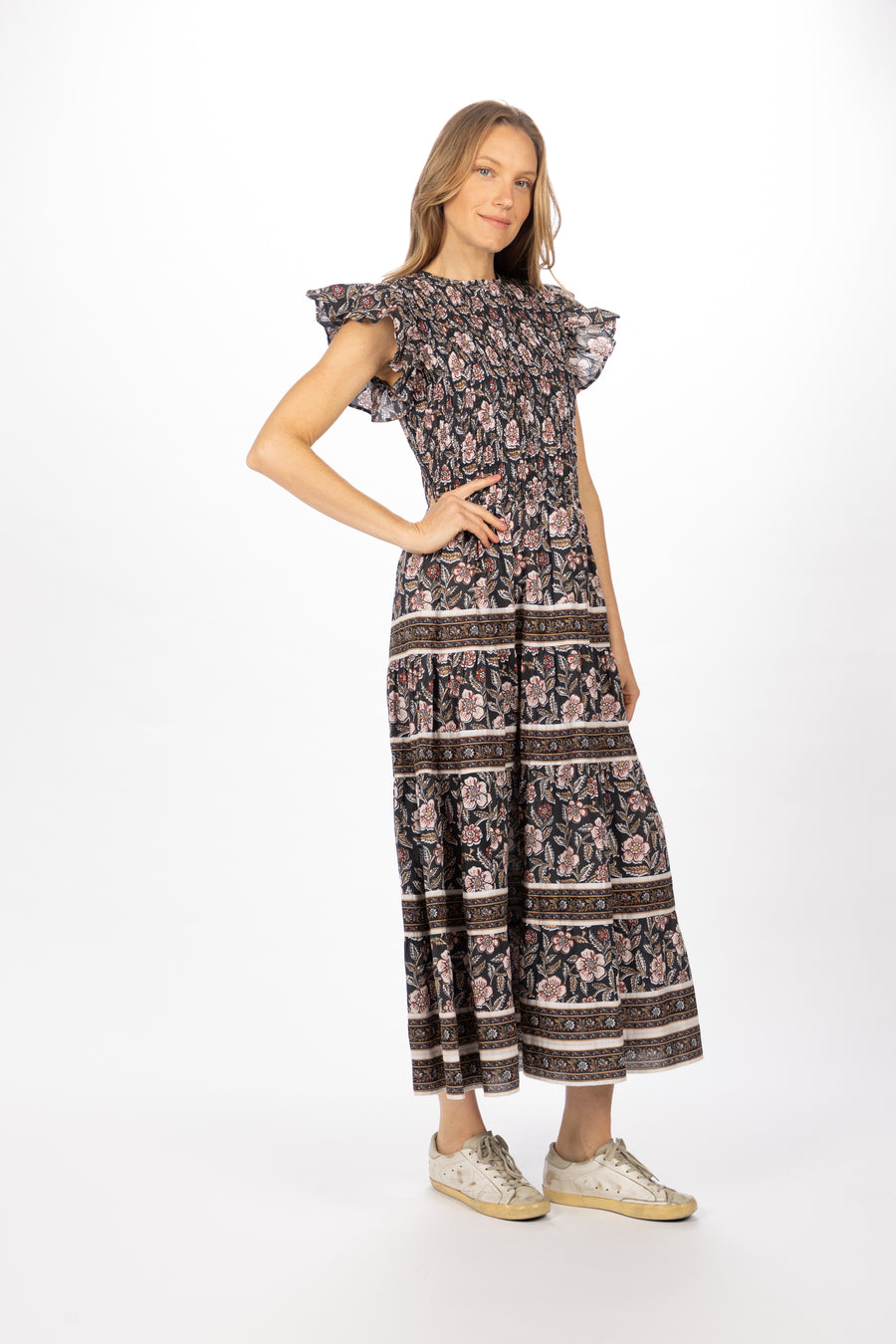 Bindu Bella Dress Black Multi – cotton floral maxi dress with smocked bodice and flutter sleeves