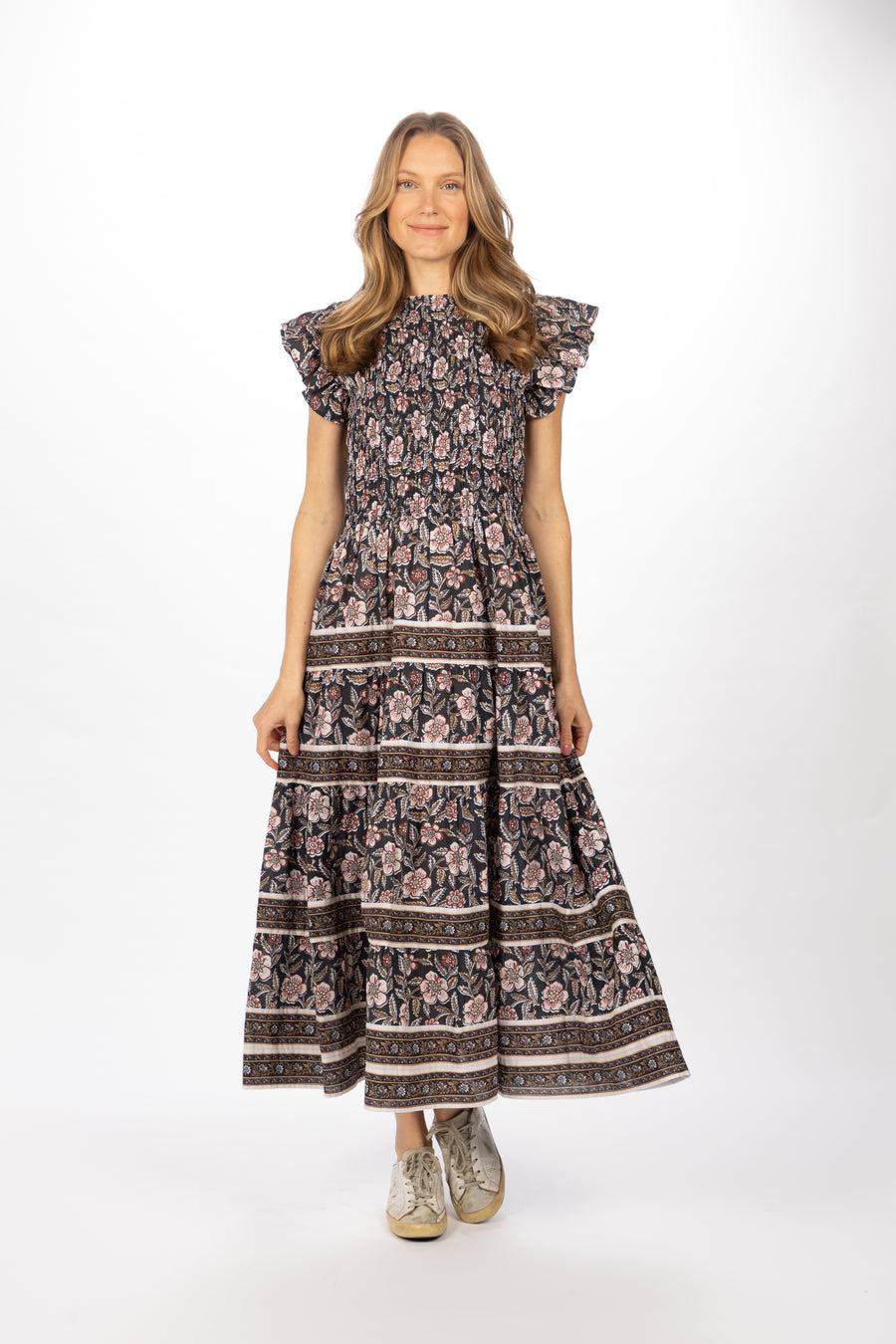 Bindu Bella Dress Black Multi – cotton floral maxi dress with smocked bodice and flutter sleeves